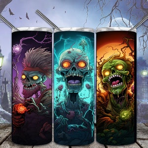May include: Three stainless steel tumblers with different zombie illustrations. The tumblers are black with a white rim and a straw. The first tumbler features a zombie with a mohawk and a beard. The second tumbler features a zombie with a green face and glowing eyes. The third tumbler features a zombie with a green face and glowing eyes.