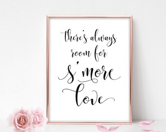 May include: A white framed print with black calligraphy that reads "There's always room for s'more love".
