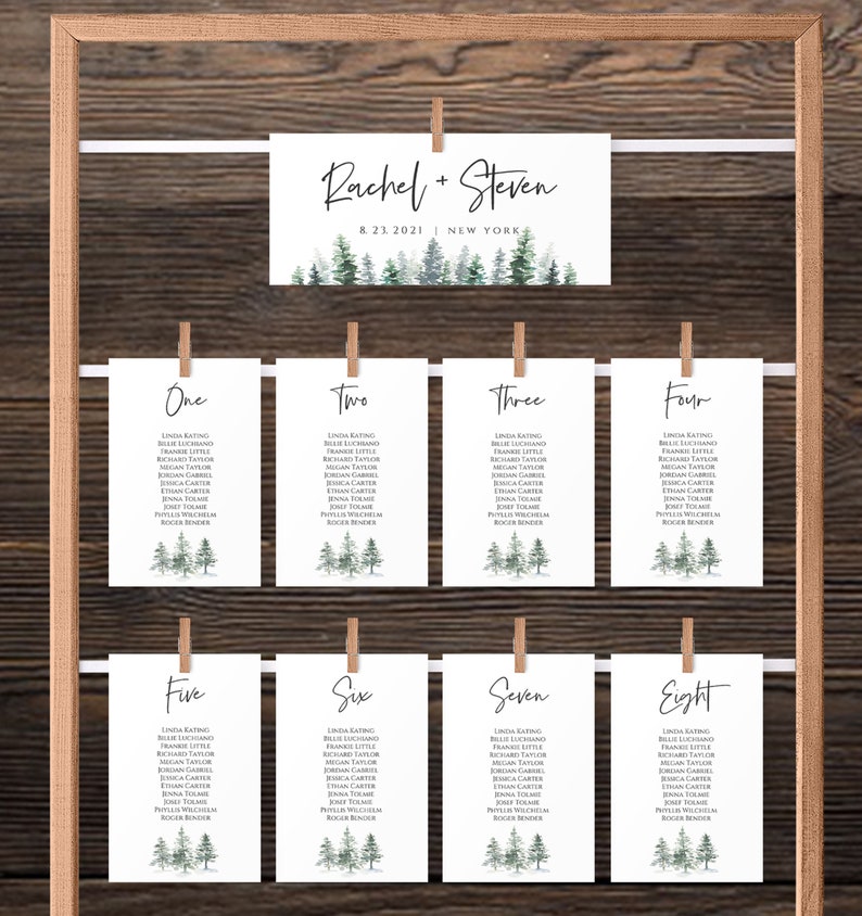 May include: Wedding seating chart with a woodland theme. The chart is printed on white cardstock and features a watercolor illustration of pine trees. The chart is divided into eight sections, each with a table number and a list of guest names.