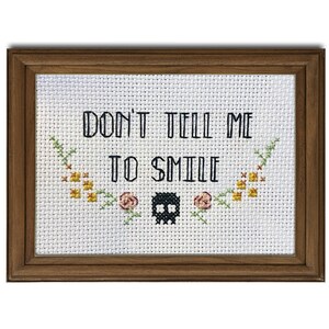Don&#39;t Tell Me To Smile || Cross stitch with floral detail