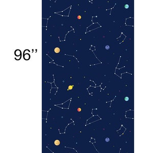 May include: Dark blue fabric featuring a repeating pattern of constellations, planets, and stars. The fabric measures 244 cm by 64 cm. The design includes yellow, orange, and blue planets, and white constellation lines.