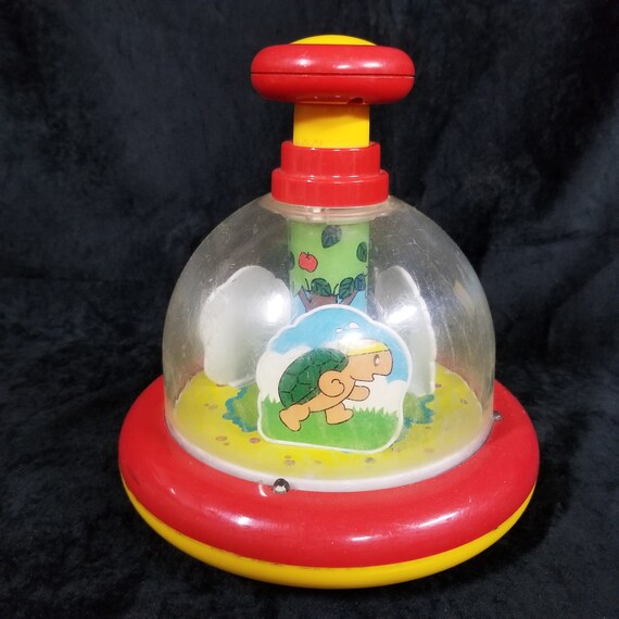 push and spin baby toy