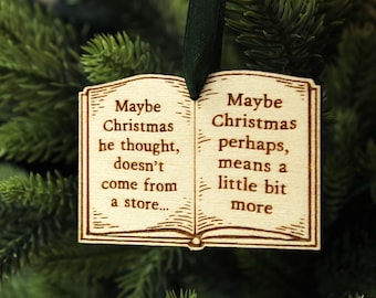 May include: Wooden Christmas ornament shaped like an open book with the text "Maybe Christmas he thought, doesn't come from a store... Maybe Christmas perhaps, means a little bit more".
