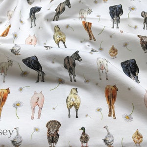 May include: White fabric with a repeating pattern of farm animals, including cows, pigs, chickens, goats, donkeys, and a turkey. The animals are all facing away from the viewer and are drawn in a cartoon style. The fabric is printed with the word "Jersey" in the bottom left corner.