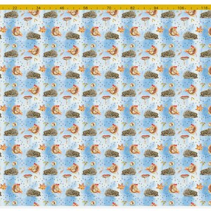 May include: A blue and white fabric with a repeating pattern of hedgehogs, mushrooms, and leaves. The hedgehogs are brown and have red bows. The mushrooms are white with brown stems. The leaves are orange and yellow.