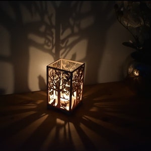 Beautiful laser cut tea light holder wolf and woodland design.