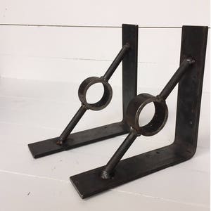 modern bracket supports with unique support bar