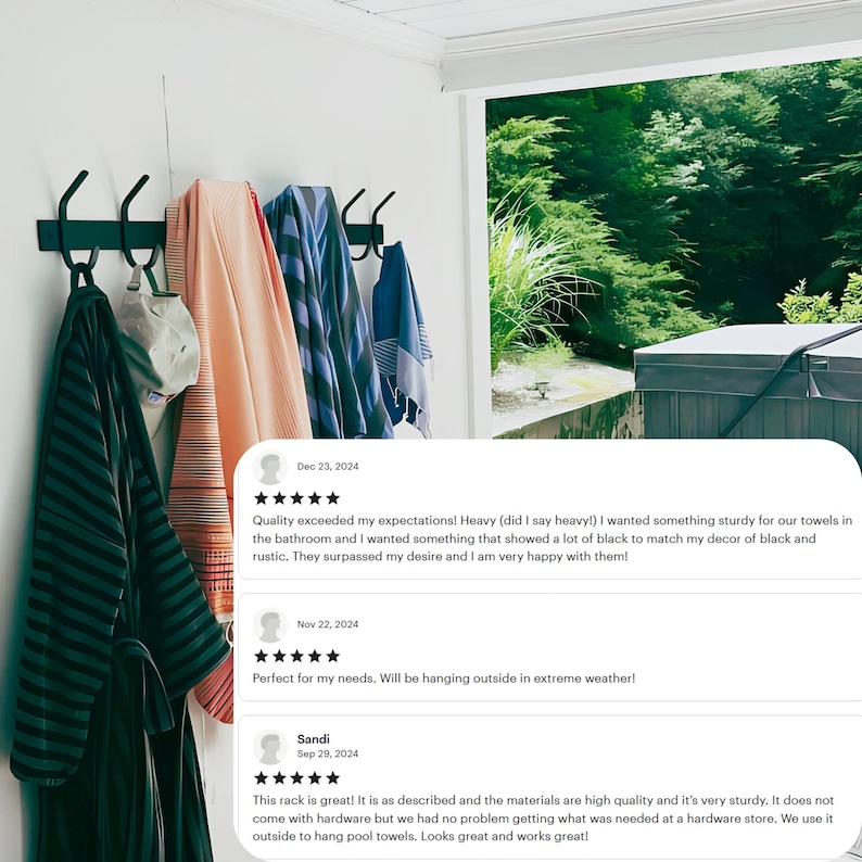 May include: Black metal towel rack with five hooks mounted on a white wall. Towels are hanging on the hooks. The rack is installed near a window with a view of a hot tub and green trees. Customer reviews are visible below the image.
