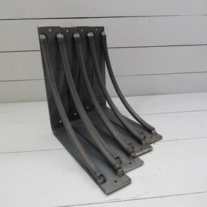L shaped bracket with double curved support