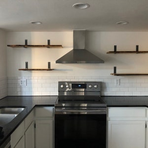 Shelf supports for open shelving in kitchen