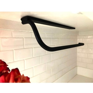 Wall mounted metal paper towel holder