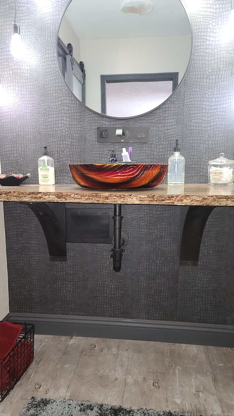 Bathroom vanity support brackets. 4 inch wide brackets with a 4 inch wide curved support bar. Perfect for heavy duty projects