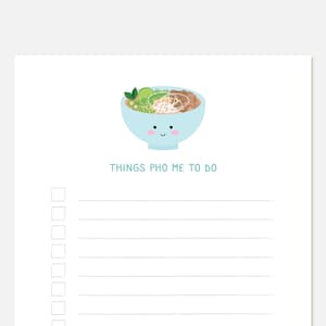May include: A light blue bowl with a smiling face filled with pho, a Vietnamese noodle soup. The bowl is on a white background with the text "THINGS PHO ME TO DO" below it. There are 10 empty checkboxes on the right side of the page.