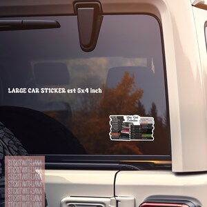 May include: A large car sticker, approximately 5x4 inches, featuring a stack of books with the text "Rina Kent Collection." The sticker is affixed to a car window. The text "STICKITWITHJANA" is repeated vertically on the left.