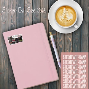 May include: A white ceramic mug with a black handle and the text "But First, Coffee" in a bold, black font. The mug is set against a neutral background, highlighting its simple design.