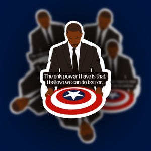 May include: A sticker featuring a Black man in a suit holding a Captain America shield. The shield is red, white, and blue. Text on the sticker reads, "The only power I have is that I believe we can do better."