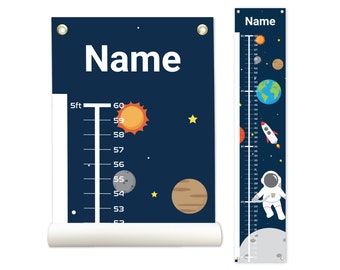 May include: A blue and white growth chart with a space theme. The chart features planets, stars, a rocket, and an astronaut. The chart is marked in inches and feet. The chart is personalized with the name "Name".