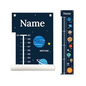 May include: A blue and black growth chart with a space theme. The chart features planets with cute faces and a star. The chart is marked in inches and feet. The chart is personalized with the name "Name".
