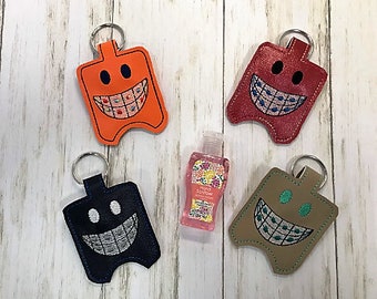 Adorable Embroidered Smiley Face with Braces: A Unique and Charming Creation!