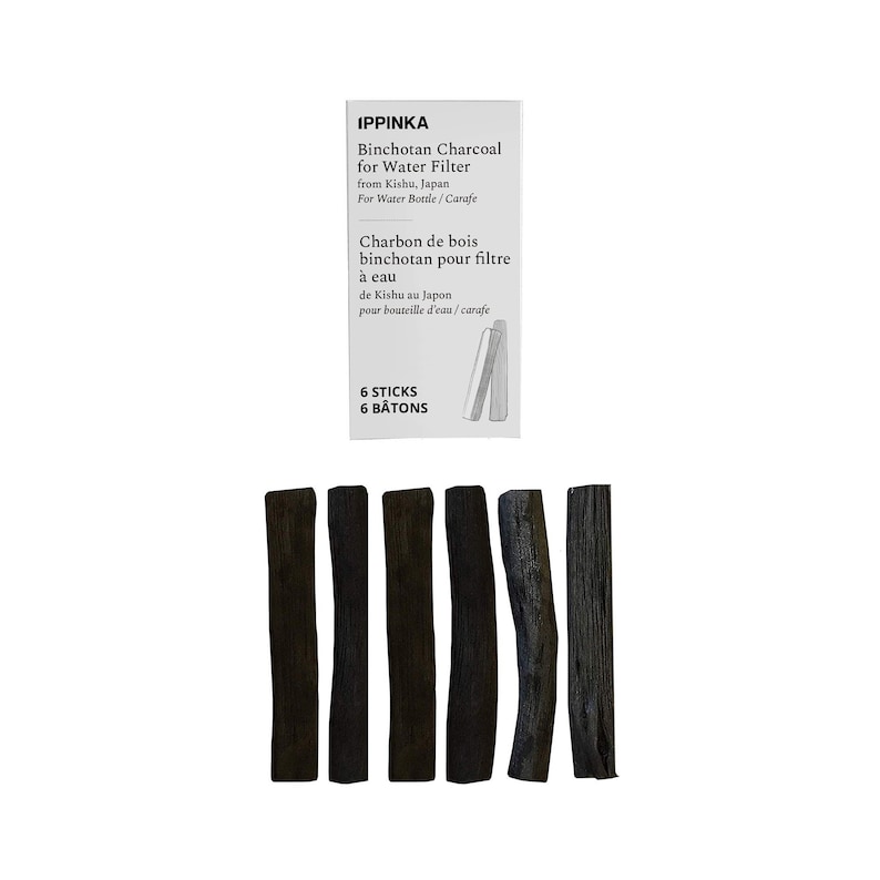May include: Six black charcoal sticks for filtering water. The sticks are from Kishu, Japan and are labeled "IPPINKA Binchotan Charcoal for Water Filter from Kishu, Japan For Water Bottle/Carafe Charbon de bois binchotan pour filtre &agrave; eau de Kishu au Japon pour bouteille d'eau/carafe 6 STICKS 6 B&Acirc;TONS".
