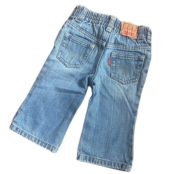 12 months VINTAGE 90's Levi Strauss 517 Flare Jeans // Light Medium Wash