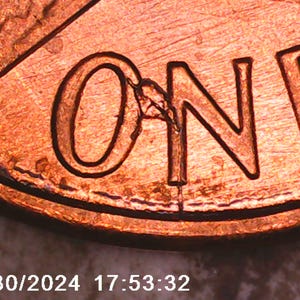 1988 Lincoln cent penny (leaf design) Die break between O and N reverse rare mint error coin