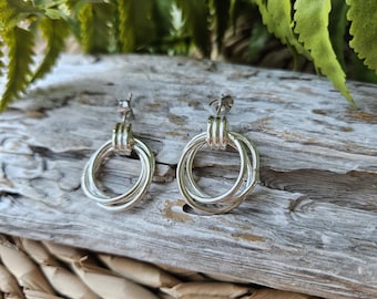 Pendientes geométricos en espiral de plata de ley: joyería marinera moderna