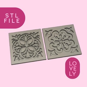 May include: Two square, gray tiles with intricate, symmetrical floral designs. The tiles are side-by-side, showcasing detailed patterns. The image includes the text "STL FILE" and "LOVELY" in pink.