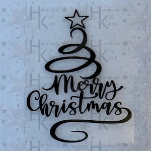 Könnte beinhalten: Schwarzer Vinyl-Aufkleber mit einem stilisierten Weihnachtsbaum und dem Text "Frohe Weihnachten".