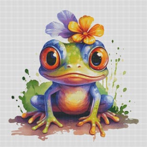 May include: A colorful frog with a flower on its head. The frog is sitting on a brown surface with green and blue watercolor splatters in the background.