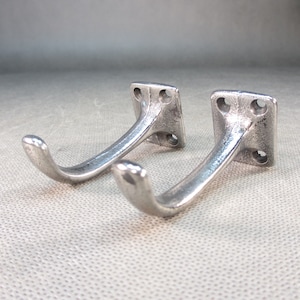TWO cast iron coat hooks 1928 vintage coat hooks Bauhaus wall coat rack antique coat rack Art Deco coat hooks vintage wall hooks