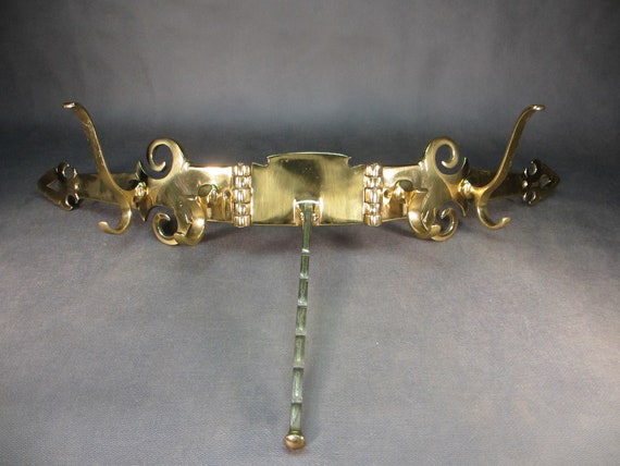 Perchero de pared de laton macizo fundido de 2 3kg. Perchero vintage gancho antiguo para ventilador de pared con cuatro ganchos para abrigos gancho para abrigos con bisagras vintage Etsy Espana