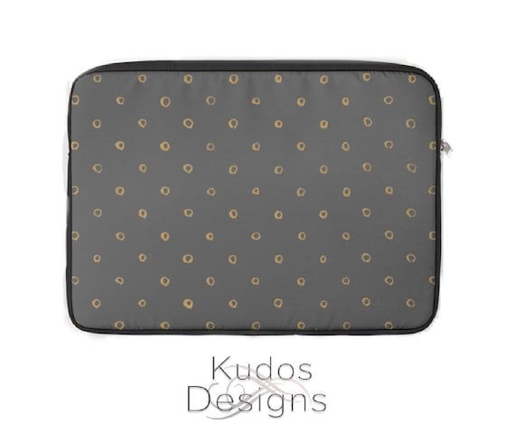 black and gold laptop bag