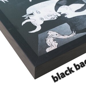 May include: A black and white abstract painting of a bull and a woman, framed in a black wood frame with a black baguette.