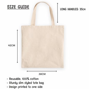 May include: A beige tote bag made of 100% cotton with long handles. The bag measures 38 cm wide by 42 cm tall and the handles are 35 cm long.  The bag is reusable and has a design printed on one side.