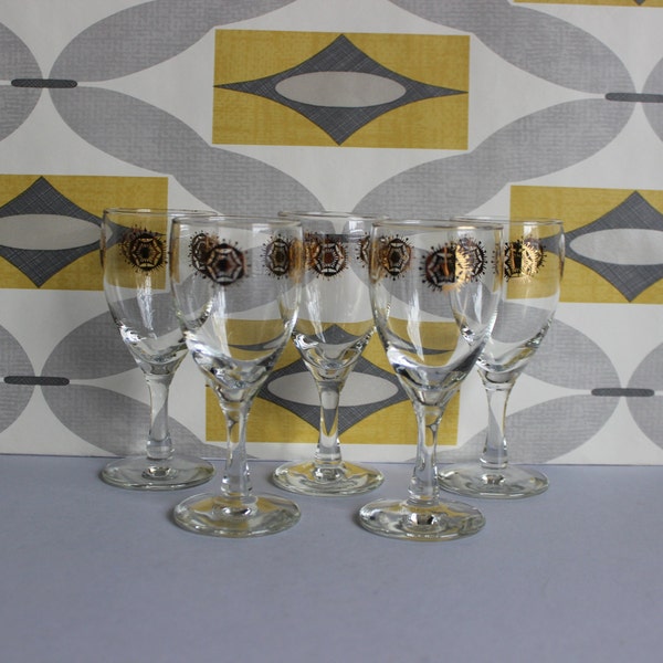 set of 5 vintage mid century gold gilded atomic flower pattern small footed sherry port glasses