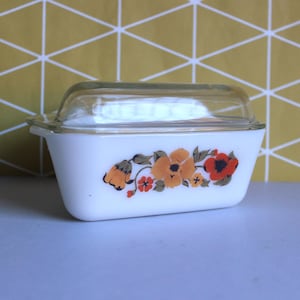 vintage 1970s JAJ Pyrex 'Ingrid' retro orange flower white opal glass lidded triangular serv-it fridge dish. Made in England