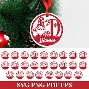 May include: A round white Christmas ornament featuring a red graphic of a gnome wearing a polka dot hat, a candy cane, and snowflakes. The letter D is integrated into the design with the name Dianne printed below. Includes A-Z alphabet options.