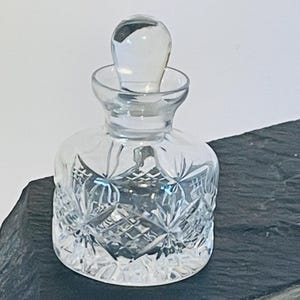 vintage cut glass perfume bottle with stopper