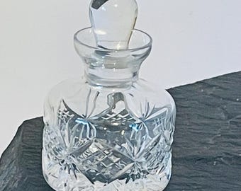 vintage cut glass perfume bottle with stopper
