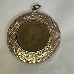 Medallón conmemorativo colgante De la reina Isabel II y el recuerdo de la adhesión del rey Jorge V