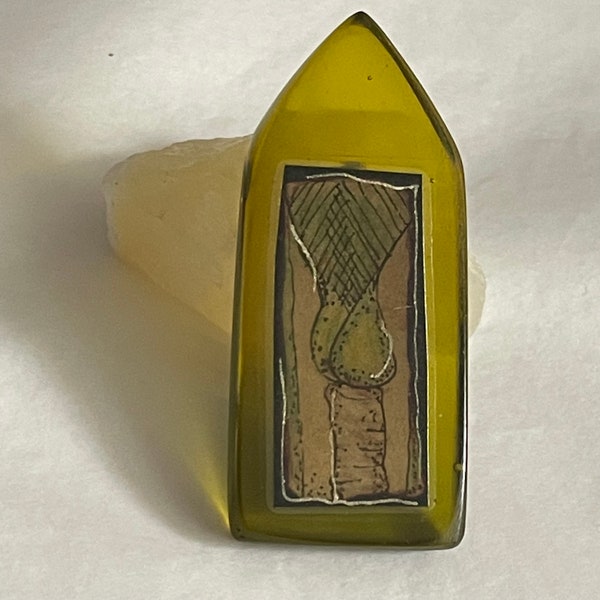 Vintage Perspex brooch Celtic style church window shape with  New Zealand Nikau Palm.