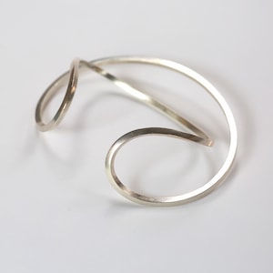 Rhea bangle, unique contemporary stacking design.