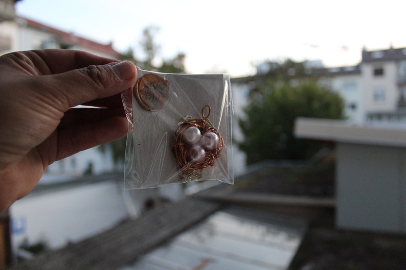 super handmade gift Bird Nest Pendant with 3 beads and green leaves including a 55cm long silver PL necklace