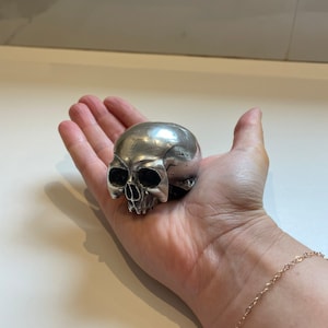 Pretty little skull in vintage silver metal