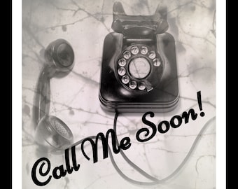 May include: A black rotary dial phone with a white dial and black cord. The phone is on a white surface with a faded background. The text "Call Me Soon!" is written in black cursive.