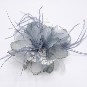 Organza, lace, and feather flower brooch. Gray and ivory color.