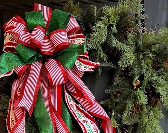 The Pierce Spearmint and Peppermint Red, White, and Green Christmas Tree Topper Bow with long streamers