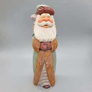 Wood Carving - Wooden Santa Carving in a Miny Green and Brown Robe Hand Carved and Painted Christmas Gifts Joinershandcrafted