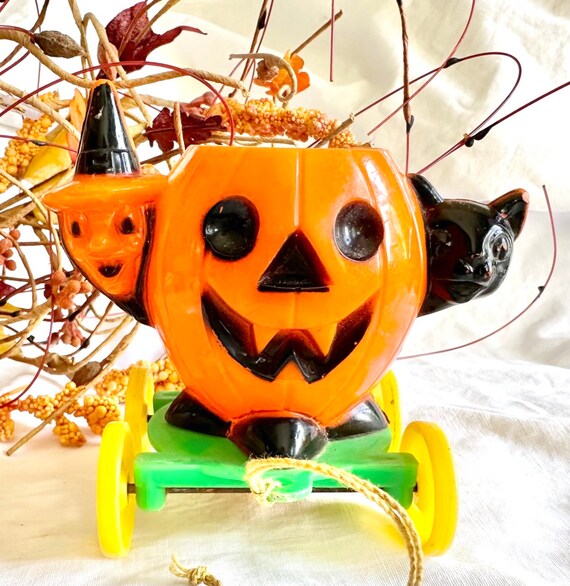 Hard Plastic Jack-o-lantern Treat Holder & Pull Toy From Rosbro